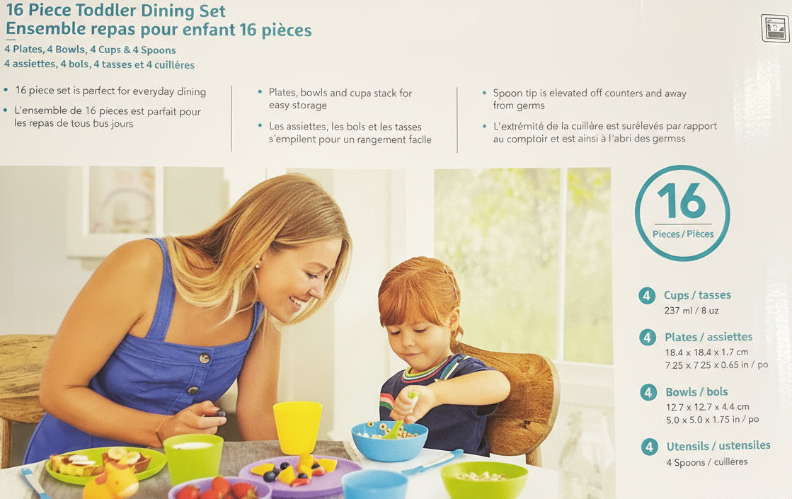 Munchkin toddler dining set packaging with a woman and child at a table.