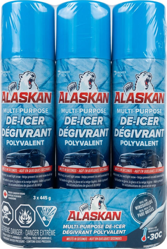 Three cans of Alaskan Multi-Purpose De-Icer on a white background