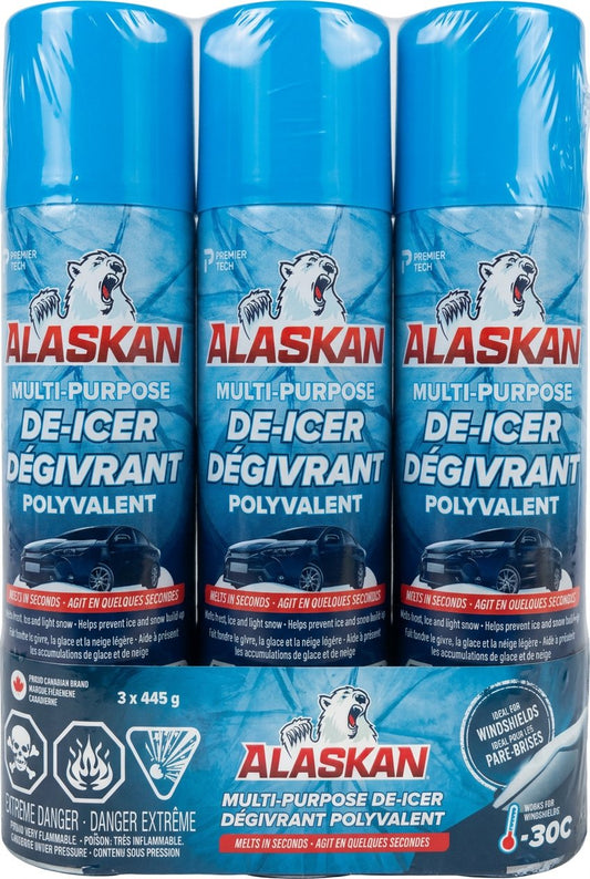 Three cans of Alaskan Multi-Purpose De-Icer on a white background