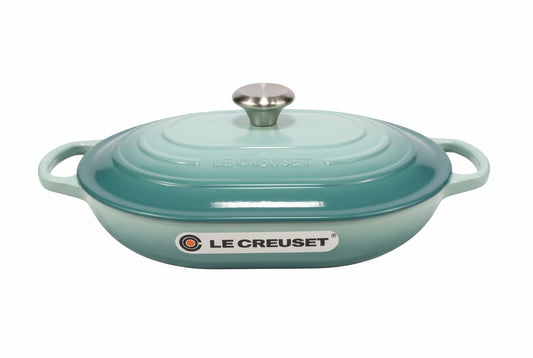 Le Creuset oblong casserole in sage color with lid
