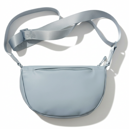 Light blue crossbody bag on a light gray background