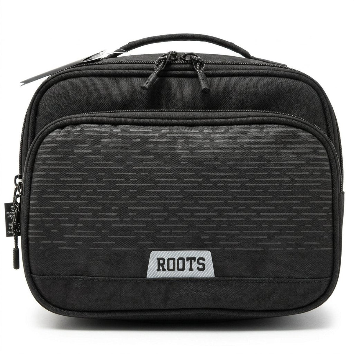 Black bag with 'ROOTS' logo on a gray textured surface