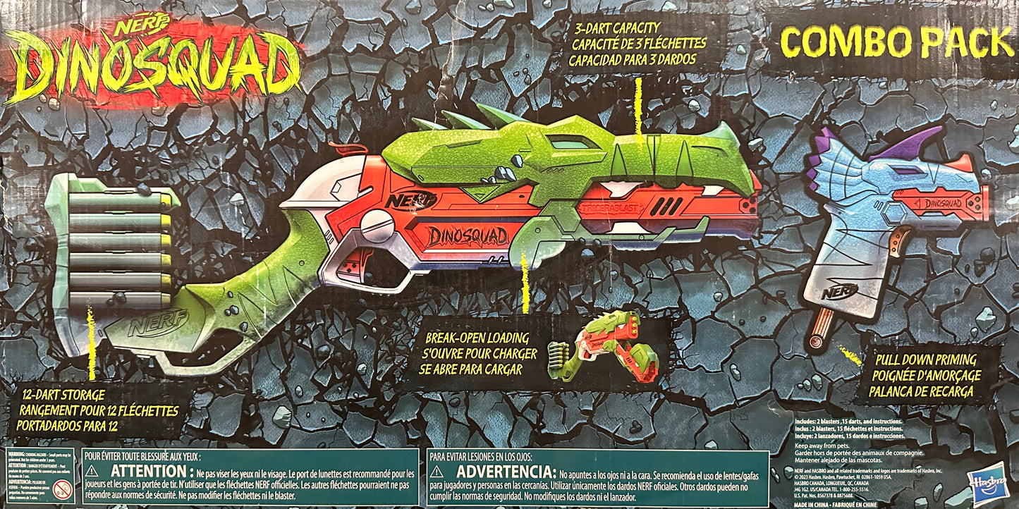 Toy gun and figures packaging with 'Dinosquad' branding on a textured gray background