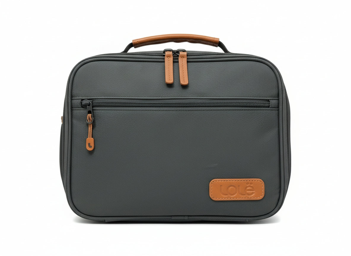 Gray toiletry bag with brown accents and 'Cote' branding on a white background