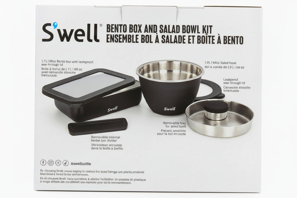 S'well bento box and salad bowl kit packaging on a black speckled surface