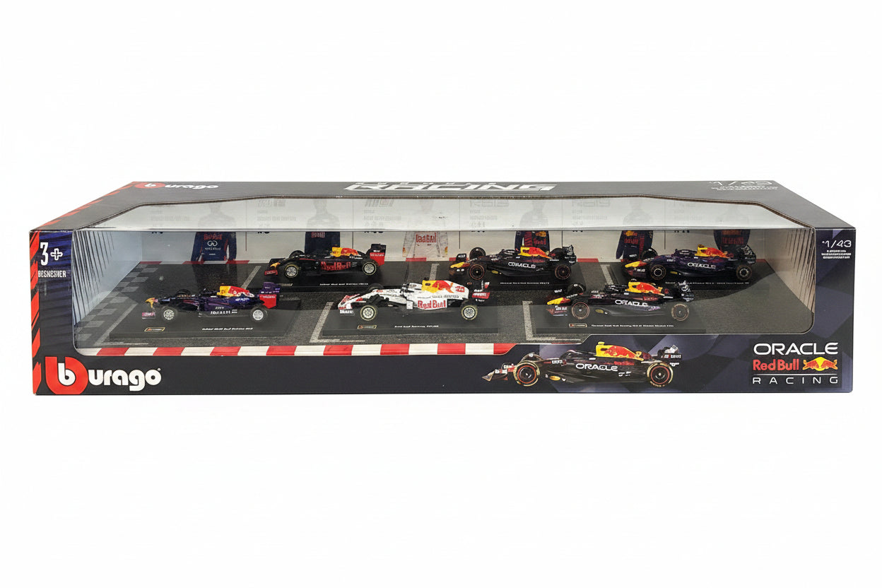 Boxed set of Formula 1 cars with branding on a dark background