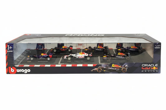 Boxed set of Formula 1 cars with branding on a dark background