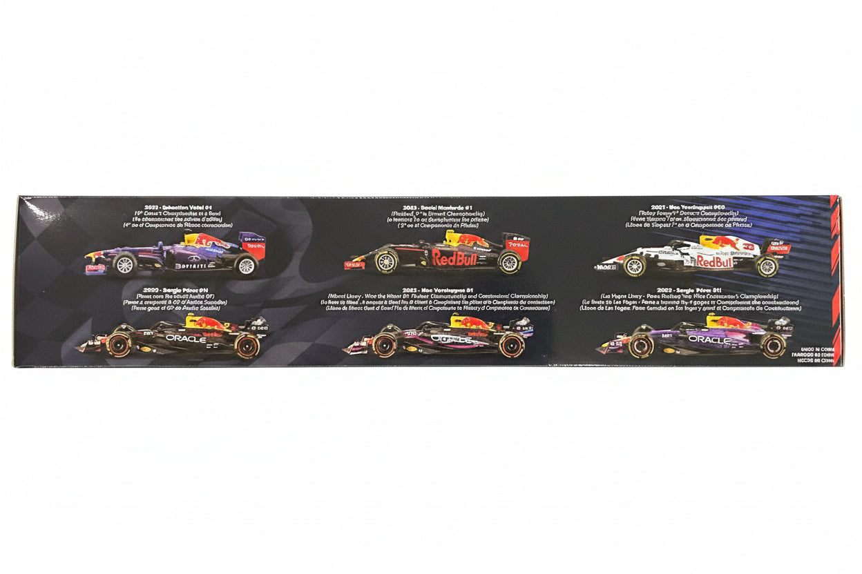 Collection of Red Bull Formula 1 cars on a display card with text
