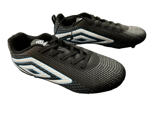 Black sports shoes with blue accents on a dark textured surface