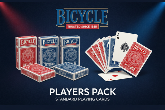 Bicycle playing cards with packaging and cards spread out on a dark background