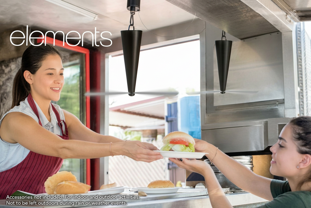 The back of the packaging box for the Elements brand wind guard, featuring a photo of a waitress in a kitchen serving a customer. The box includes a barcode, item number ITM.