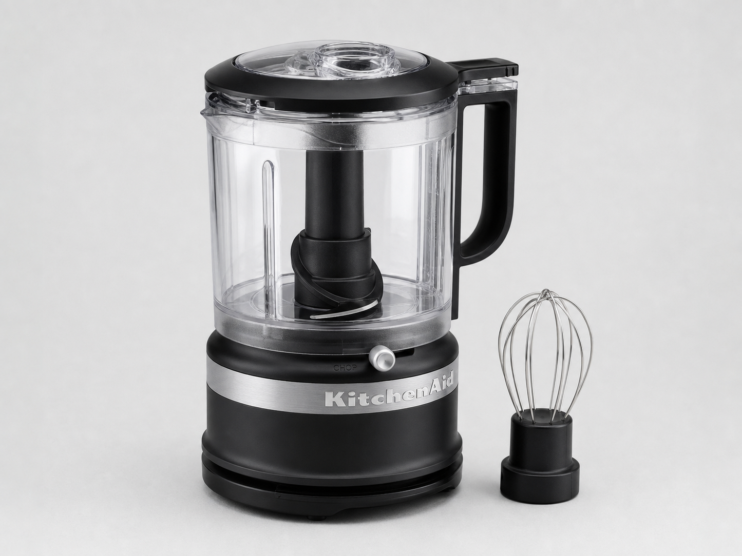 KitchenAid 5-cup matte black food chopper with whisk accessory