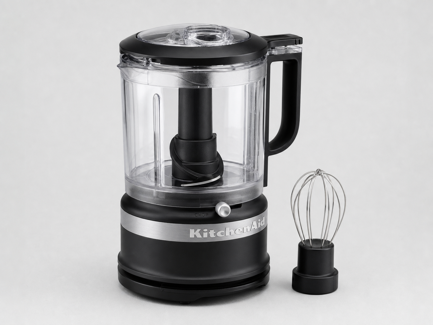 KitchenAid 5-cup matte black food chopper with whisk accessory