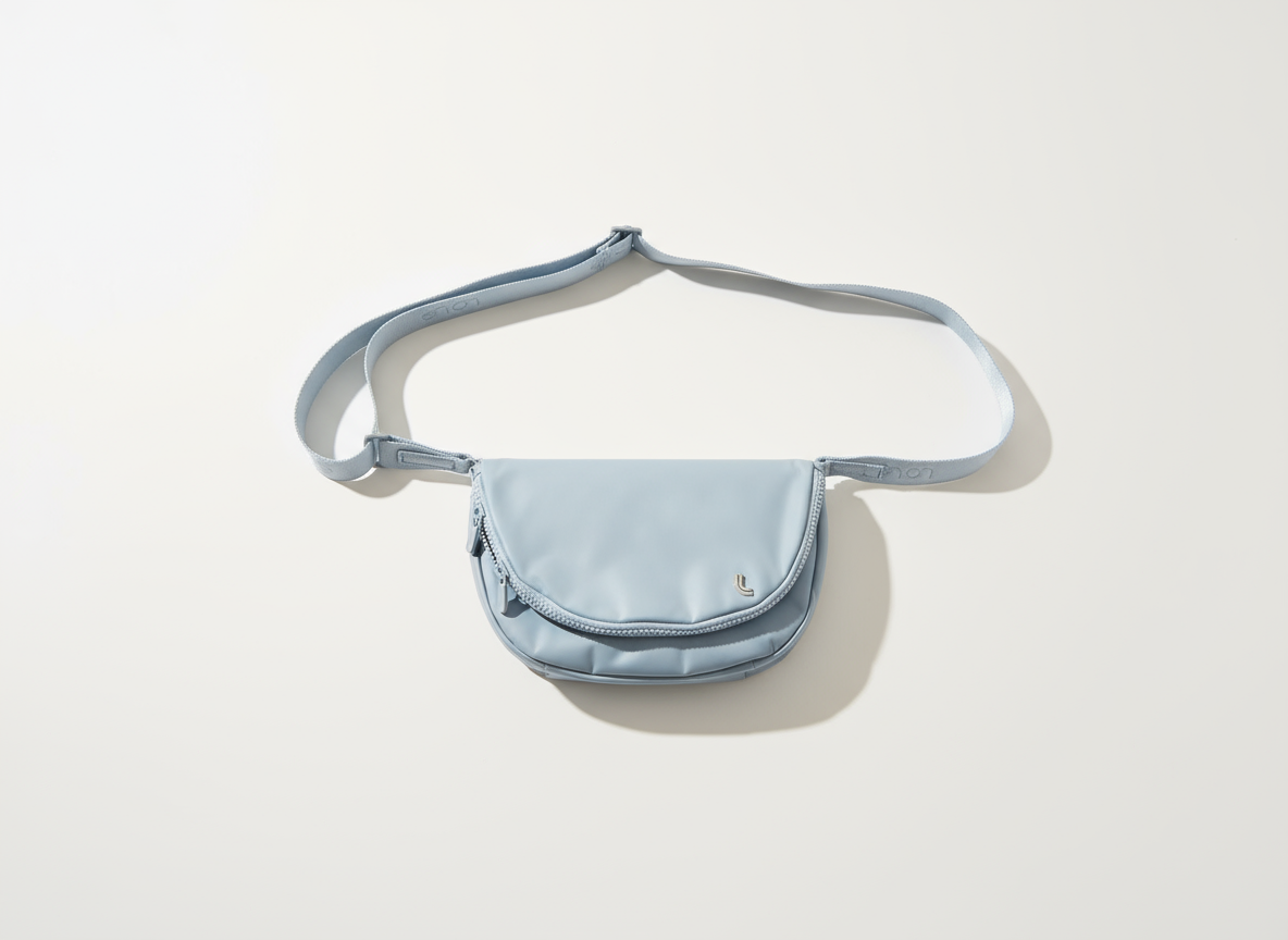 Light blue crossbody bag on a white background