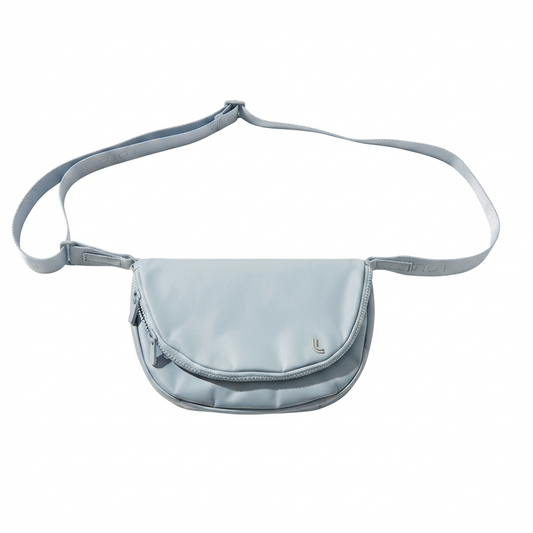 Light blue crossbody bag on a white background