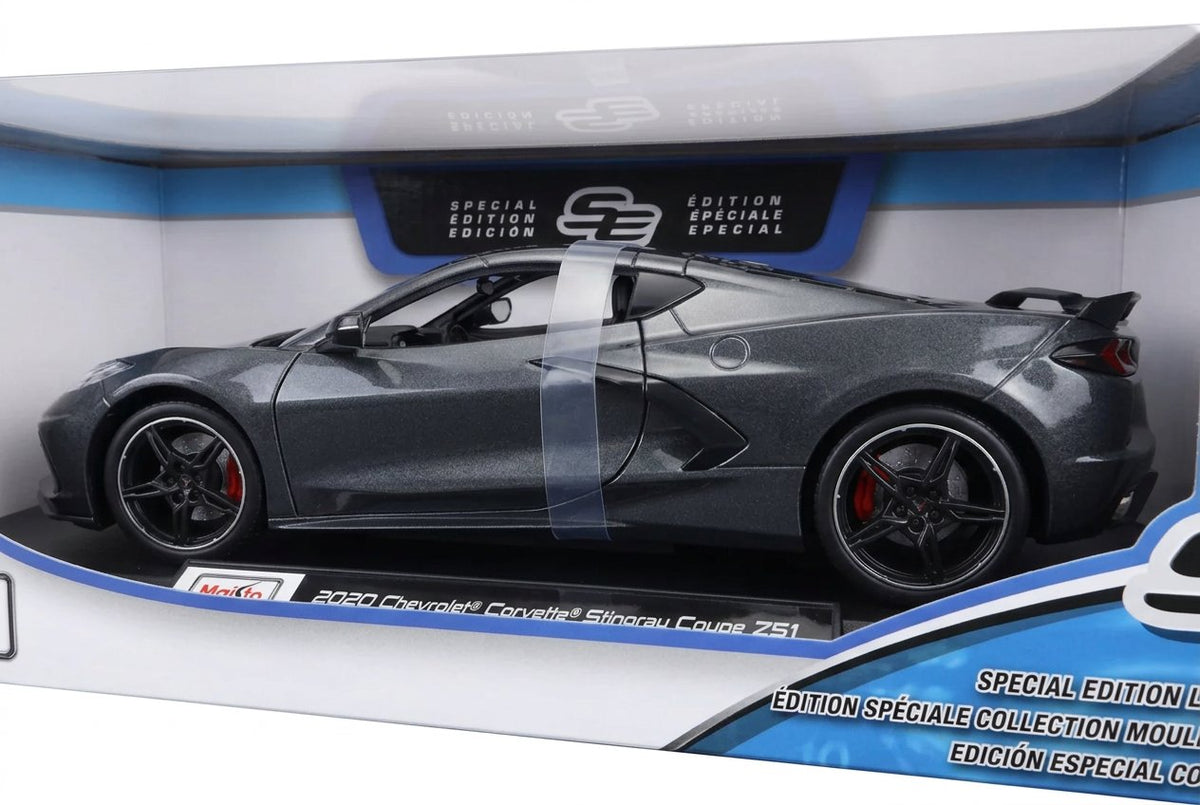 Close-up of the Maisto Corvette Stingray Coupe Z51 grey model through the box window