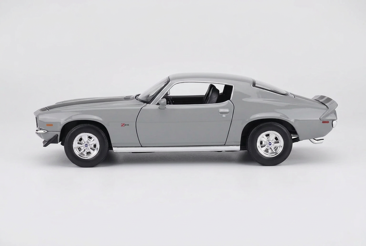 Side profile of the grey Maisto 1971 Chevrolet Camaro Z28 1:18 model with black stripes and rear spoiler