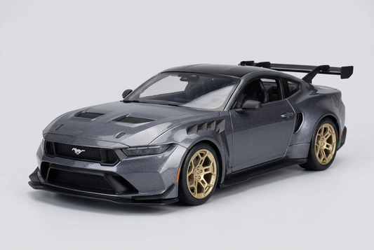 Metallic grey Maisto 2025 Ford Mustang GTD 1:18 die-cast model car with gold wheels and rear wing