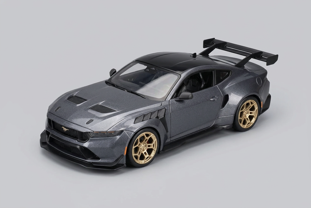 Grey Maisto 2025 Ford Mustang GTD 1:18 model seen from above at a front angle