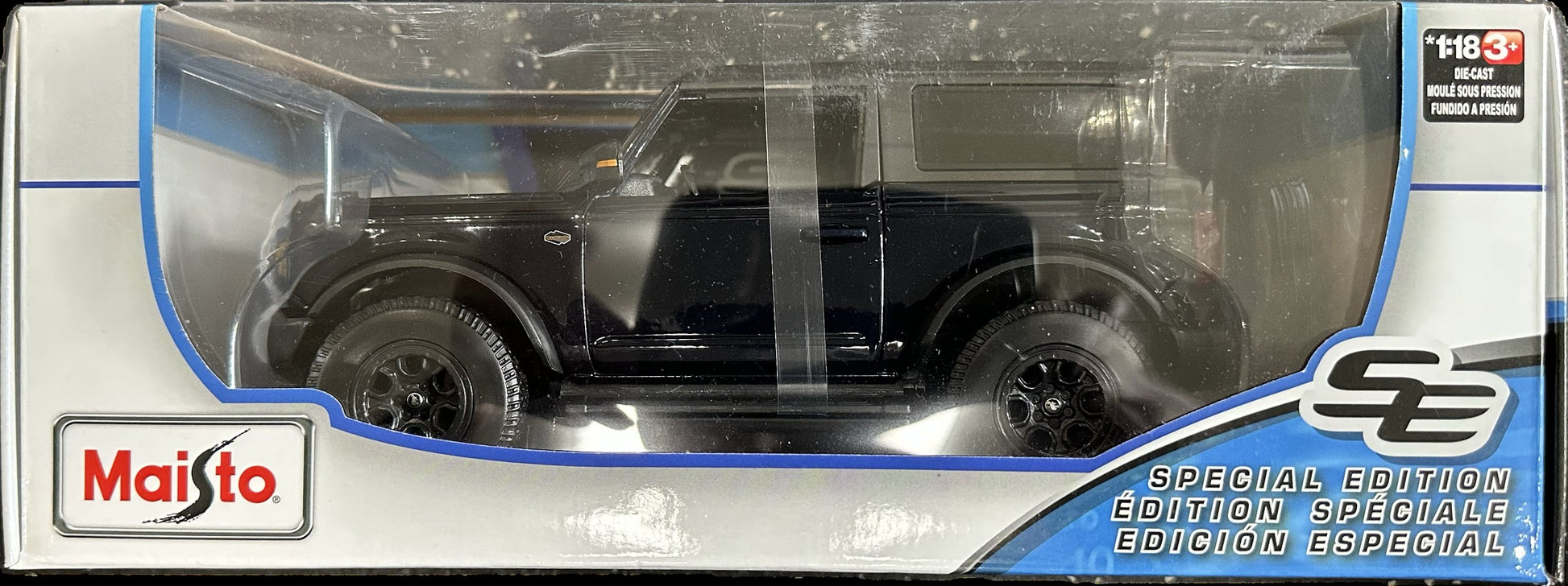 Maisto Special Edition black SUV-style 1:18 die-cast toy car in box