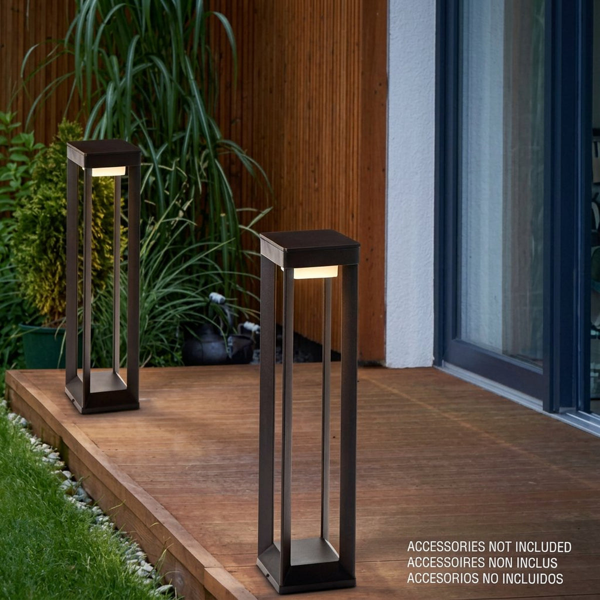 Solar pathway bollard lights shown on an outdoor deck