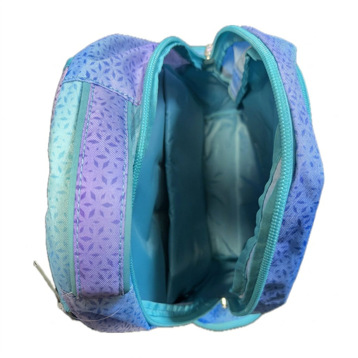 Roots backpack opened from above showing the lined main compartment