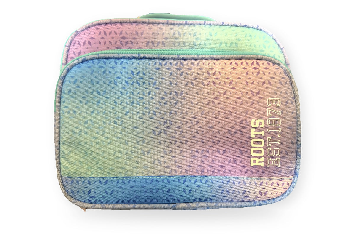 Roots insulated lunch bag in teal, blue and lavender ombré with a petal print, front view with the Roots Est. 1973 logo