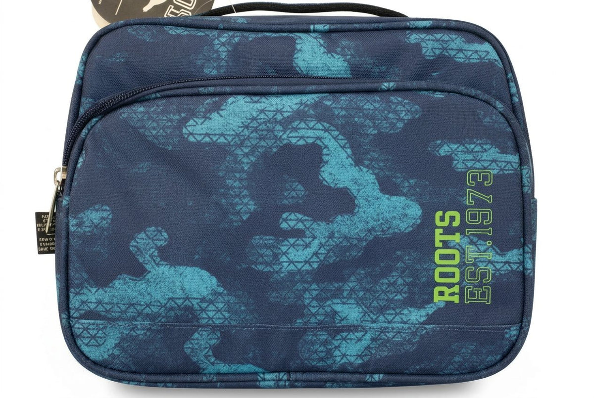 Blue camouflage bag with 'Roots' branding on a dark textured surface