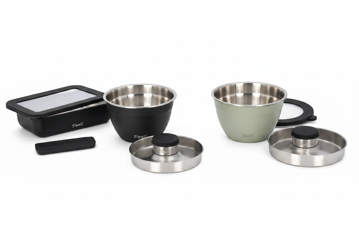 Set of stainless steel kitchen containers on a white background